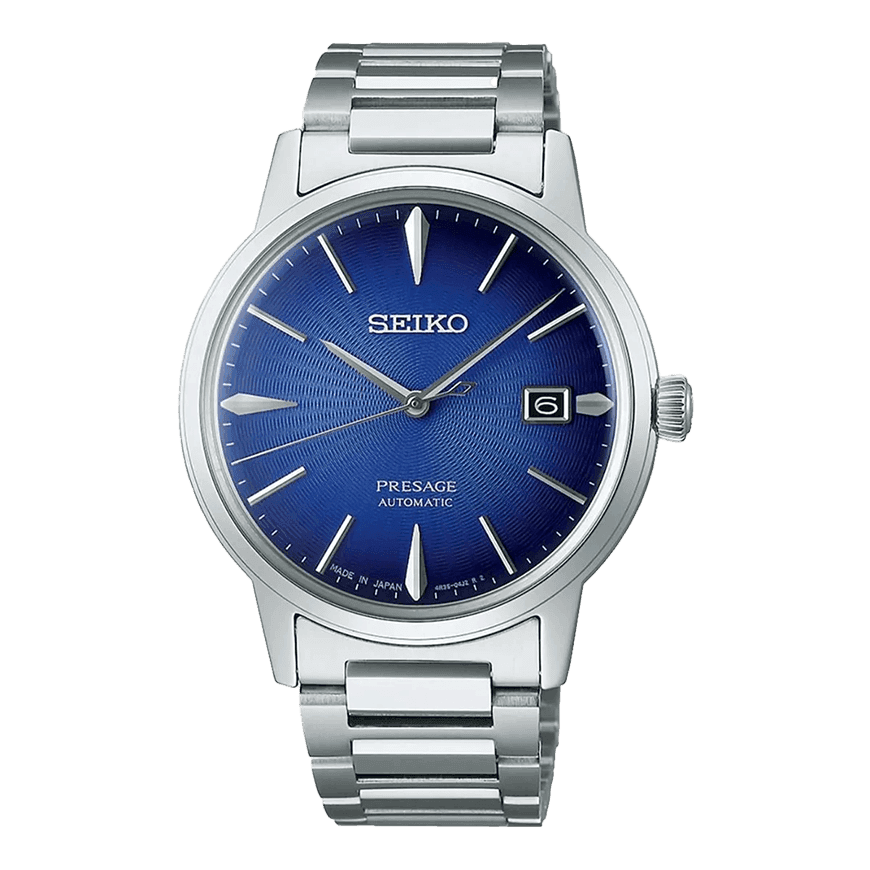 En Seiko Presage automatisk klokke med blå urskive, sølvfargede timemarkører, datovisning og lenke i rustfritt stål.